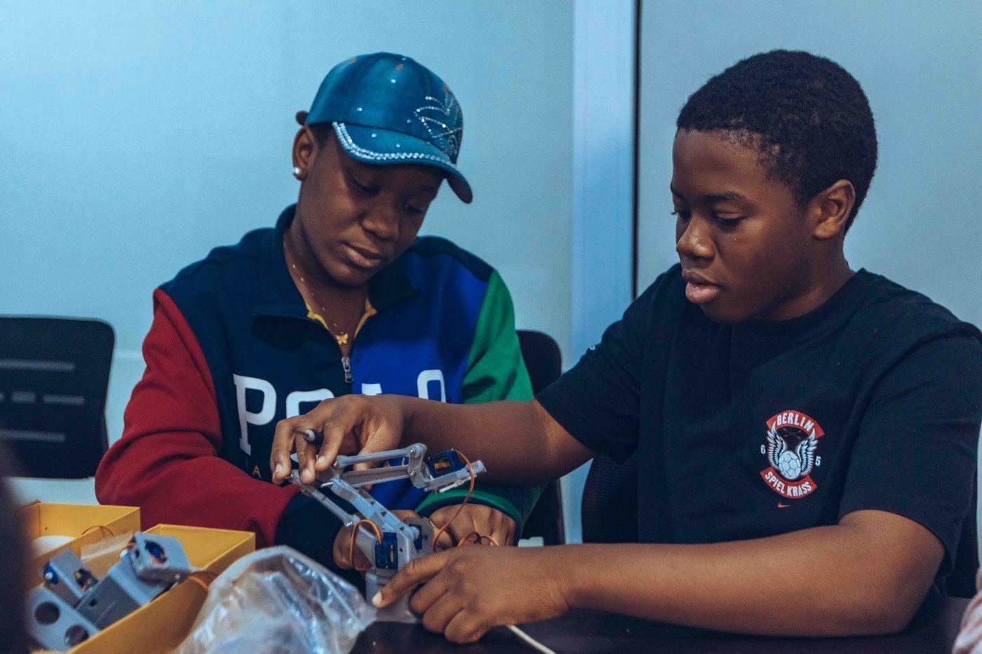 Students working together on an engineering build