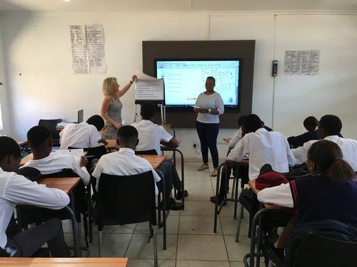 A facilitator leading a classroom session